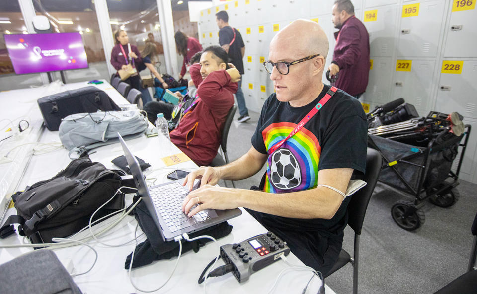 Grant Wahl, pictured here working in the FIFA Media Centre at the World Cup.