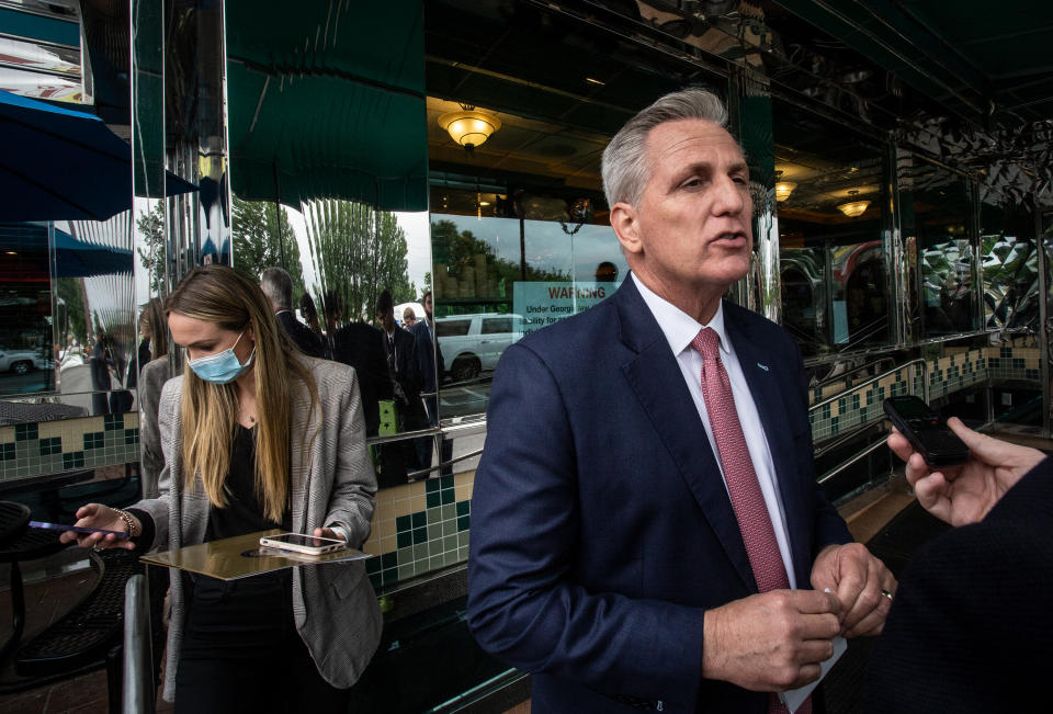 In this May 4, 2021, photo, House Minority Leader Kevin McCarthy, of Calif., speaks to a reporter outside a diner in Marietta, Ga. McCarthy and other Republicans decried Major League Baseball's decision to move the All-Star game out of Georgia amid concerns about changes to the state's voting laws. McCarthy is leading his party to an inflection point. House Republicans are preparing to dump Rep. Liz Cheney from the No. 3 leadership position. If so, McCarthy will have transformed what’s left of the party of Lincoln more decisively into the party of Trump. (AP Photo/Ron Harris, File)