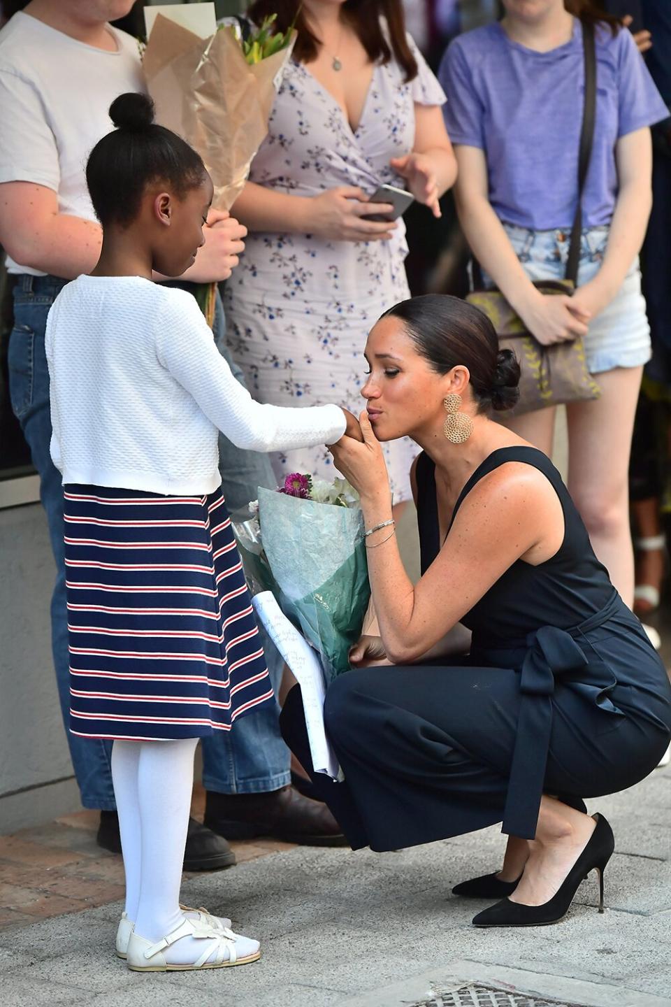 Meghan, Duchess of Sussex visits the African not-for-profit organisation 'mothers2mothers' during the royal tour of South Africa on September 25, 2019 in Cape Town, South Africa. The organisation trains and employs women living with HIV as frontline health workers across eight African nations.