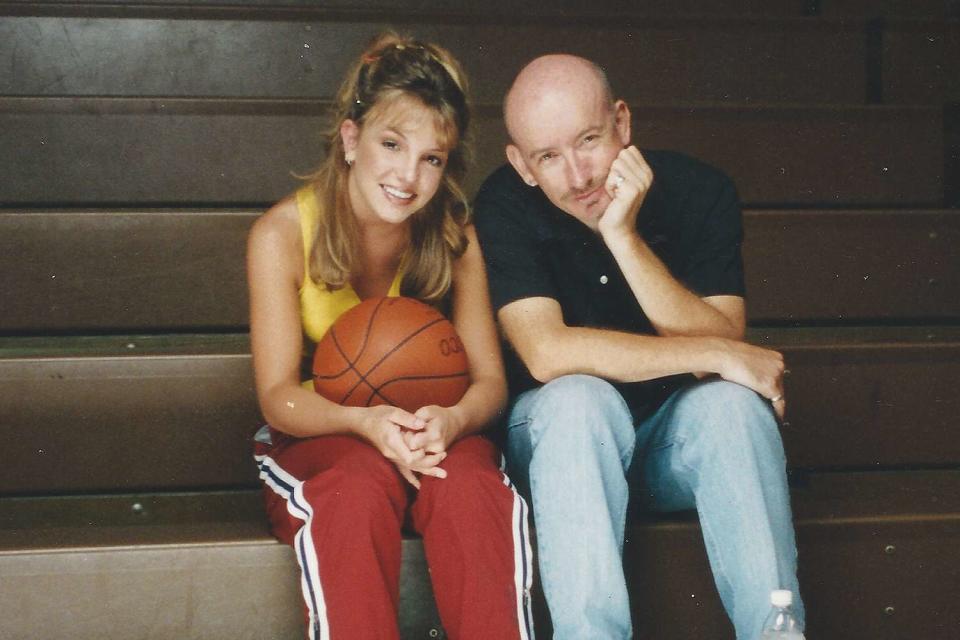 <p>Courtesy of Nigel Dick</p> Britney Spears and Nigel Dick on the set of 1998