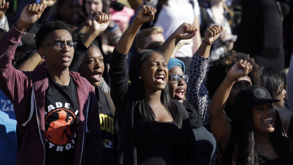 Students cheer while listening to members of the black student protest group Concerned Student 1950 speak, following the announcement that University of Missouri System President Tim Wolfe would resign Monday, Nov. 9, 2015. - Jeff Roberson/AP