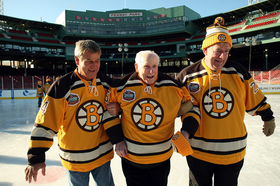 <p>BOSTON – DECEMBER 18: Boston Bruins legend Bobby Orr, left, helps another Bruins legend Milt Schmidt off the ice with help from another Bruins legend Terry O’Reilly for the First Skate at Fenway Park on Dec. 18, 2009. As part of the Winter Classic, the Boston Bruins Legends took to the ice. (Photo by John Tlumacki/The Boston Globe via Getty Images) </p>