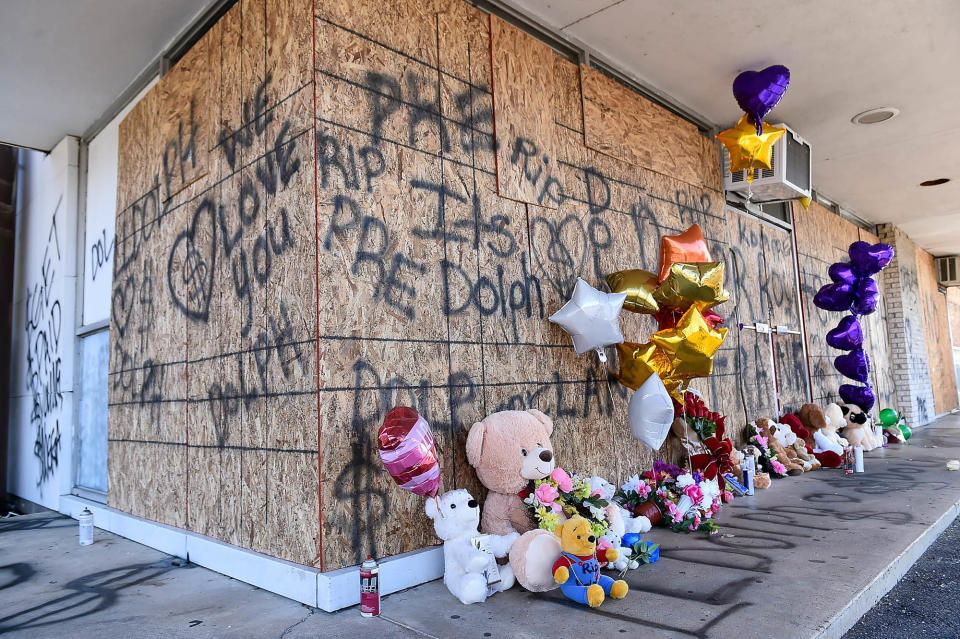 MEMPHIS, TENNESSEE - NOVEMBER 18: Fans of Young Dolph set up a memorial outside of Makeda's Cookies bakery on November 18, 2021 in Memphis, Tennessee. Rapper Young Dolph, born as Adolph Thorton Jr., was killed at the age of 36 in a shooting at Makeda's Cookies bakery on November 17th in Memphis. (Photo by Justin Ford/Getty Images)