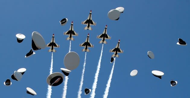 The Thunderbirds perform a fly-over as graduates from the U.S. Air Force Academy toss their hats in the air on June 2, 2016. See more photos from the week’s news <a href="http://www.theatlantic.com/photo/2016/06/photos-of-the-week-528-63/485465/?utm_source=yahoo" rel="nofollow noopener" target="_blank" data-ylk="slk:here;elm:context_link;itc:0;sec:content-canvas" class="link ">here</a>. (Kevin Lamarque / Reuters)