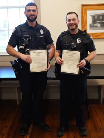 <p>Courtesy Dighton Police Department</p> Officers Kenneth Almeida and Aaron Swartz, who helped saved Manuel “Manny” Teixeira in March