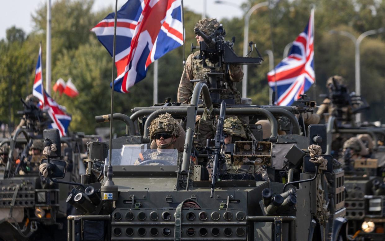 British soldiers take part in a military parade in Warsaw on Polish Army Day