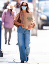 <p>Katie Holmes takes her groceries home in New York City on Tuesday.</p>