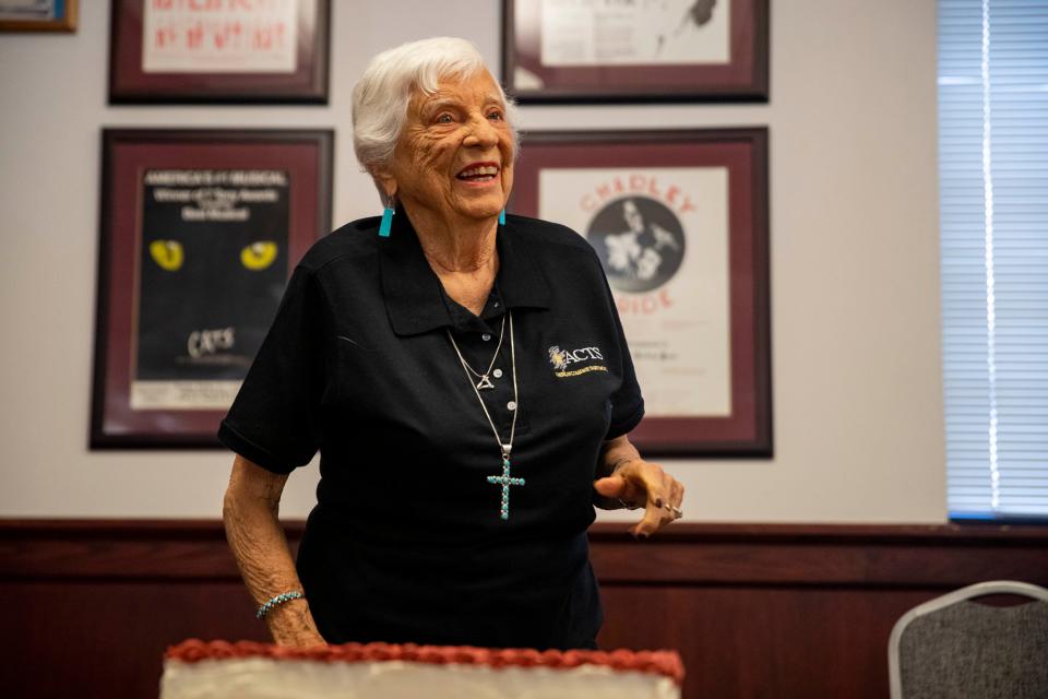 Barbara Hubbard cuts her birthday cake during her 95th birthday celebration at the Pan American Center on Tuesday, July 12, 2022. Barbara was the university's first special events director and became a legend in the concert booking business. 