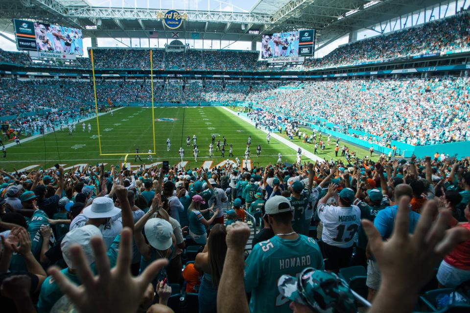 Miami Dolphins fans cheer after Miami Dolphins tight end Durham Smythe (81) scored the opening touchdown for the Dolphins in the the first quarter of the game between host Miami Dolphins and the Houston Texans at Hard Rock Stadium on Sunday, November 27, 2022, in Miami Gardens, FL. Final score, Miami Dolphins, 30, Houston Texans, 15.