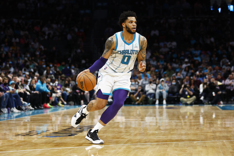 Miles Bridges of the Charlotte Hornets dribbles the ball in a game against the Toronto Raptors at Spectrum Center on February 25, 2022 in Charlotte, North Carolina. / Credit: Jared C Tilton / Getty Images