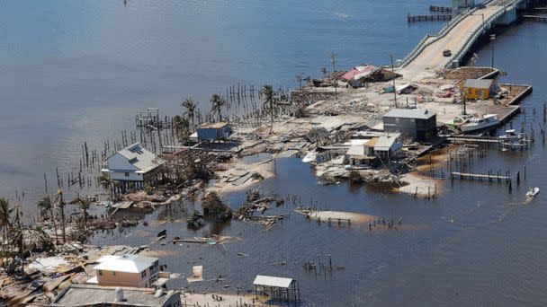 PHOTO: Destroyed homes and businesses on Pine Island, Florida are seen from a U.S. Army National Guard Blackhawk helicopter after Hurricane Ian caused widespread destruction in Pine Island, Fla., Oct. 1, 2022.  (Kevin Fogarty/Reuters)