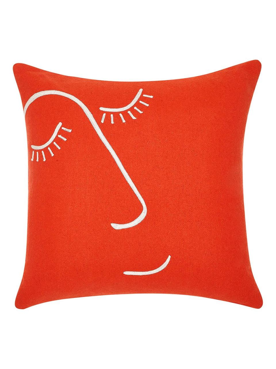 105) Embroidered cushion