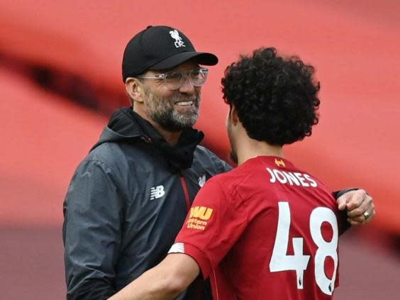 Curtis Jones celebrates with manager Jurgen Klopp (Reuters)