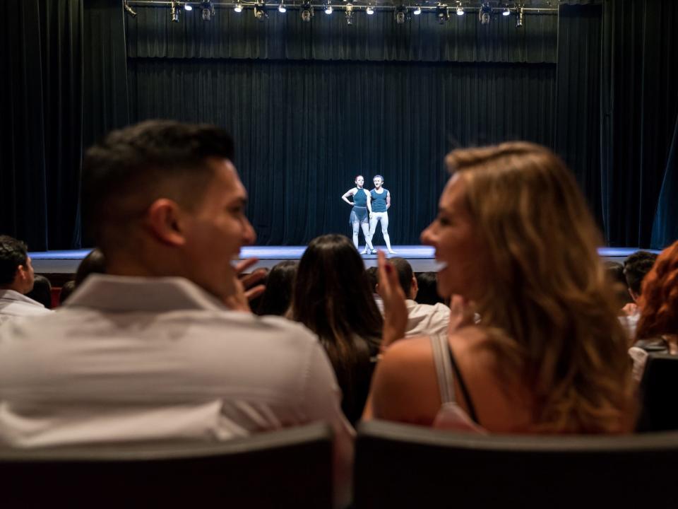 A couple at a play.