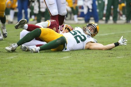 Sep 23, 2018; Landover, MD, USA; Green Bay Packers linebacker Clay Matthews (52) sacks Washington Redskins quarterback Alex Smith (11) in the third quarter at FedEx Field. Matthews received a roughing the passer penalty on the play. The Redskins won 31-17. Mandatory Credit: Geoff Burke-USA TODAY Sports