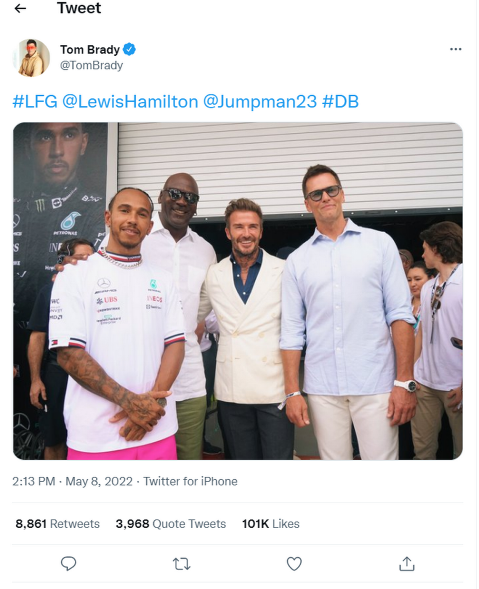 Tampa Bay Buccaneers quarterback Tom Brady (right) took a photo with other sports legends such as Michael Jordan (middle left), David Beckham (middle right) and Lewis Hamilton (left) at the Crypto.com Miami Grand Prix on Sunday, May 8, 2022.