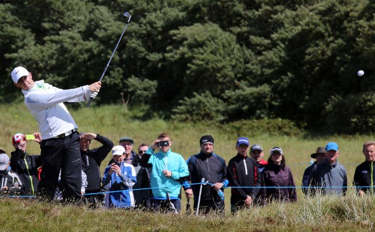 Northern Irish golfer Rory McIlroy plays out of the rough on the second day of the Irish Open at the Royal County Down Golf Club in Newcastle in Northern Ireland on May 29, 2015