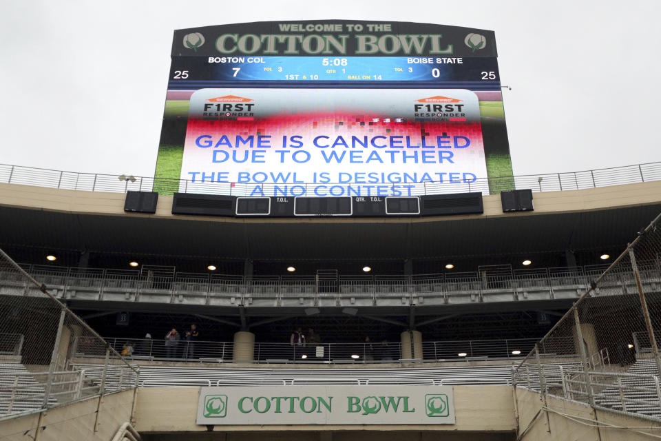 The First Responder Bowl between Boston College and Boise State was canceled due to weather and was designated a no contest after multiple lighting delays Wednesday, Dec. 26, 2018, in Dallas. (AP Photo/Richard W. Rodriguez)