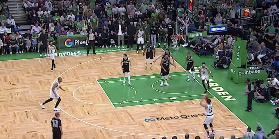 A screenshot shows Grant Williams shooting a wide-open three-pointer in the corner.