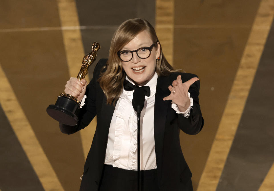 Sarah Polley accepts the Best Adapted Screenplay award for Women Talking during the Academy Awards on March 12.