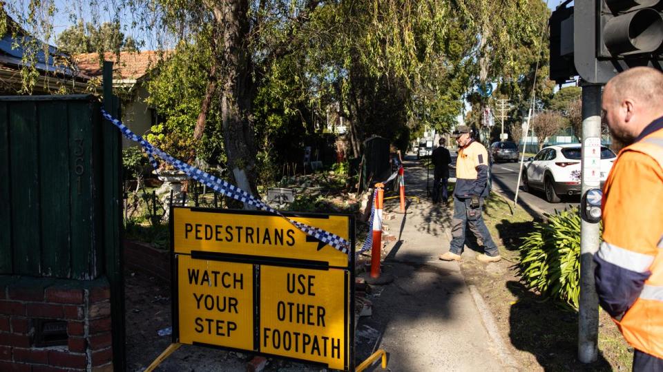 Council workers clean up after the crash.