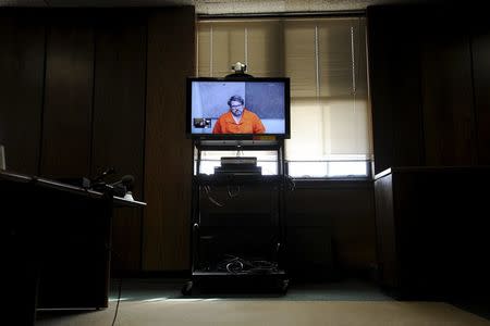 Jason Dalton is seen on closed circuit television during his arraignment in Kalamazoo County, Michigan, February 22, 2016. REUTERS/Mark Kauzlarich