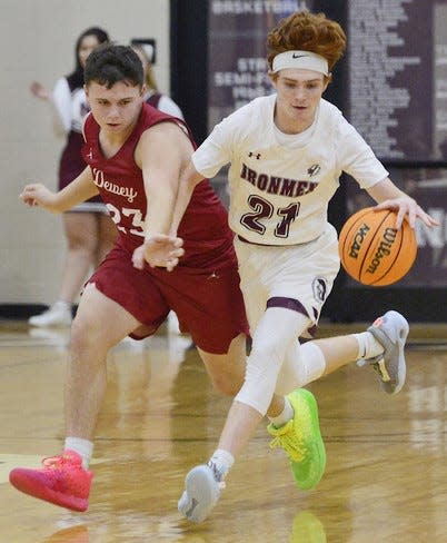 Dewey's Clayton Evans, left, tries to pressure Nowata's Skyler Stevens during high school boys basketball action on Dec. 2, 2022, in Nowata. Nowata won, 65-55.