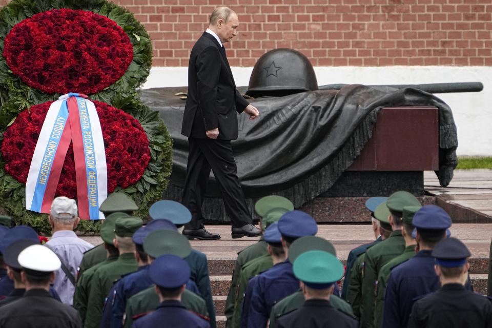 FILE - Russian President Vladimir Putin attends a wreath laying ceremony at the Tomb of Unknown Soldier in Moscow, Russia, Wednesday, June 22, 2022, marking the 81st anniversary of the Nazi invasion of the Soviet Union. By unleashing the disastrous war in Ukraine, Europe's largest military conflict since World War II, Putin has broken an unwritten social contract that saw the Russians tacitly agree to forego post-Soviet political freedoms in exchange for a relative prosperity and internal stability. (AP Photo/Alexander Zemlianichenko, Pool, File)