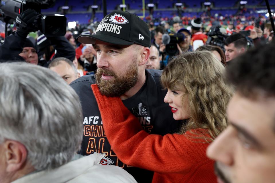 BALTIMORE, MARYLAND - JANUARY 28: Travis Kelce #87 of the Kansas City Chiefs celebrates with Taylor Swift after a 17-10 victory against the Baltimore Ravens in the AFC Championship Game at M&T Bank Stadium on January 28, 2024 in Baltimore, Maryland. (Photo by Patrick Smith/Getty Images)