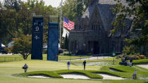 The flag flies at half staff near the ninth green in memory of Supreme Court judge Ruth Bader Ginsburg at Winged Foot Golf Club during the third round of the US Open Golf Championship, Saturday, Sept. 19, 2020, in Mamaroneck, N.Y. Ginsburg died on Friday. (AP Photo/Charles Krupa)