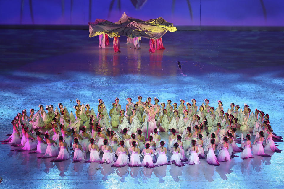 Dancers perform during the opening ceremony of the 31st Southeast Asian Games in Hanoi, Vietnam Sunday, May 12, 2022. The SEA Games 31 takes place from May 12 to May 23 in Hanoi, and 11 nearby provinces. (AP Photo/Minh Hoang)