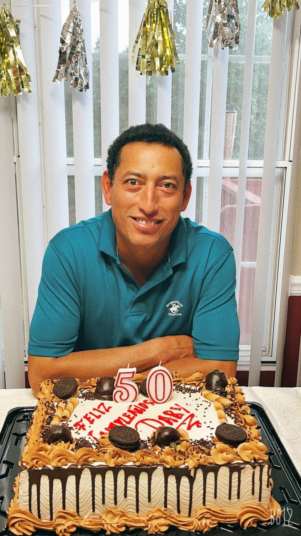 Dario Carvajal-Dominguez poses for a photo on his 50th birthday. He worked for NHM Constructors for about 20 years in the Asheville area before his death in December 2021.