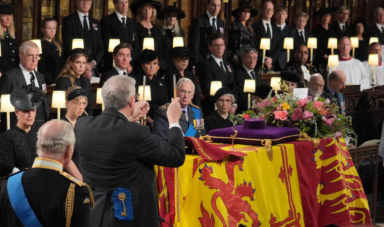 The Lord Chamberlain ceremonially breaks his Wand of Office on the coffin at the Committal Service for Queen Elizabeth II, held at St George's Chapel in Windsor Castle, Berkshire. Picture date: Monday September 19, 2022.