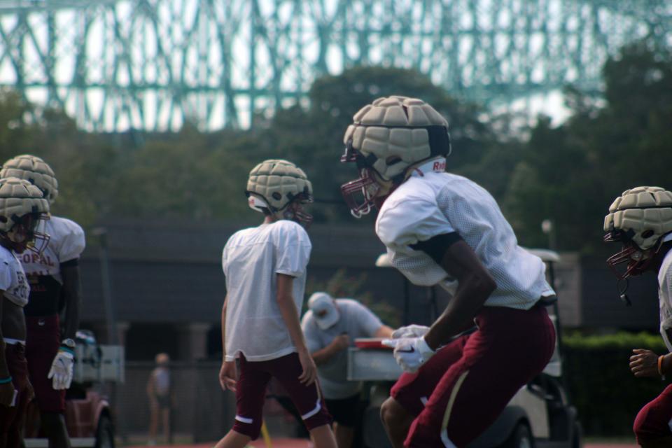 Episcopal School of Jacksonville defensive backs backpedal in coverage drills at high school football practice near the Hart Bridge on August 15, 2022. [Clayton Freeman/Florida Times-Union]