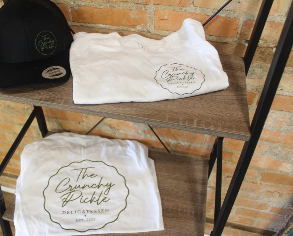 At The Crunchy Pickle, 116 N. State St. in downtown Howell, there is merchandise including hats and shirts to purchase.