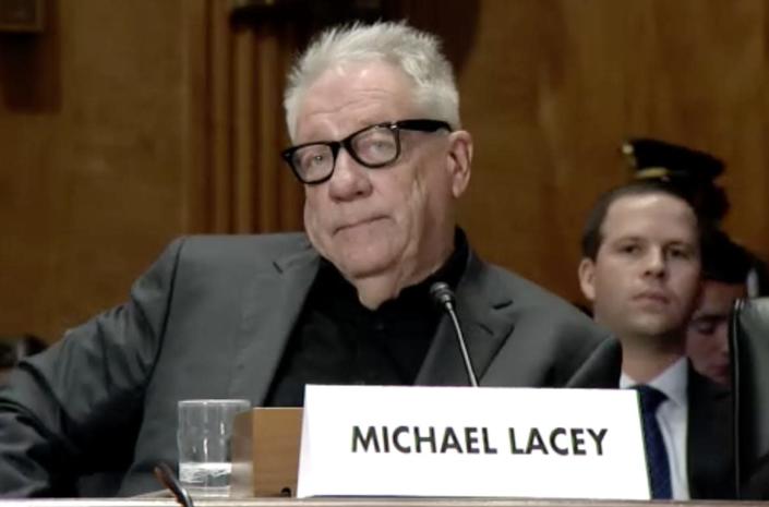 <div class="inline-image__caption"><p>Michael Lacey testifies before the U.S. Senate in 2017.</p></div> <div class="inline-image__credit">U.S. Senate</div>
