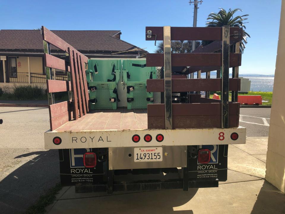 In this March 13, 2019, handout provided by the California Department of Corrections and Rehabilitation a pair of death penalty chamber chairs sit on a truck after their removal at San Quentin State Prison, in San Quentin, Calif. Gov. Gavin Newsom signed an executive order, Wednesday, placing a moratorium on the death penalty. (California Department of Corrections and Rehabilitation via AP)