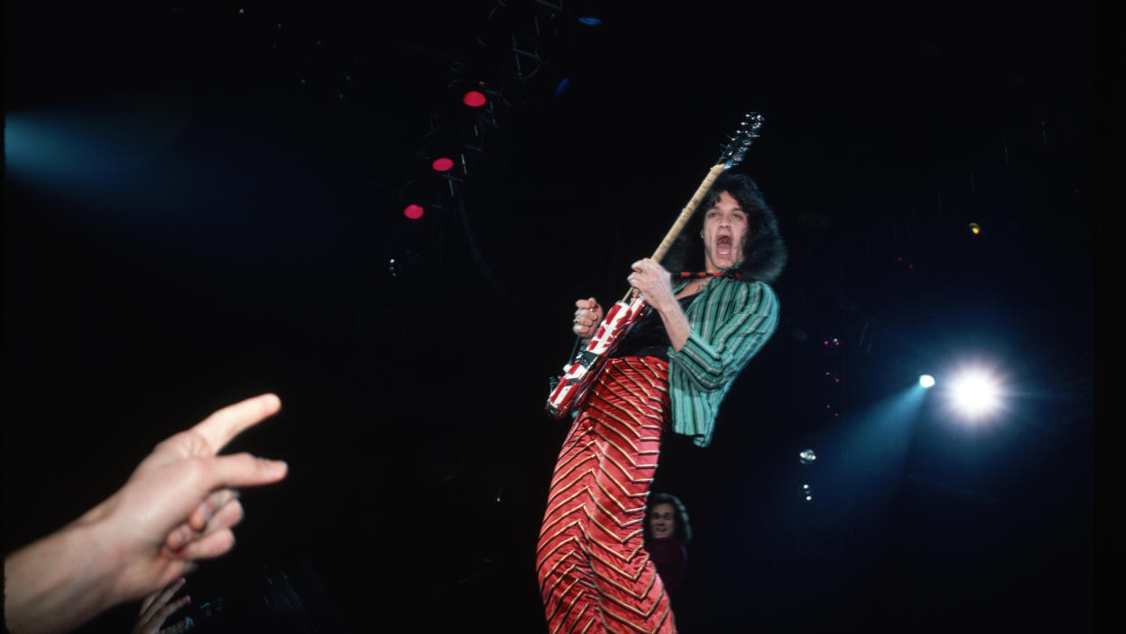  Eddie Van Halen on stage performing. Photograph, 1978. 