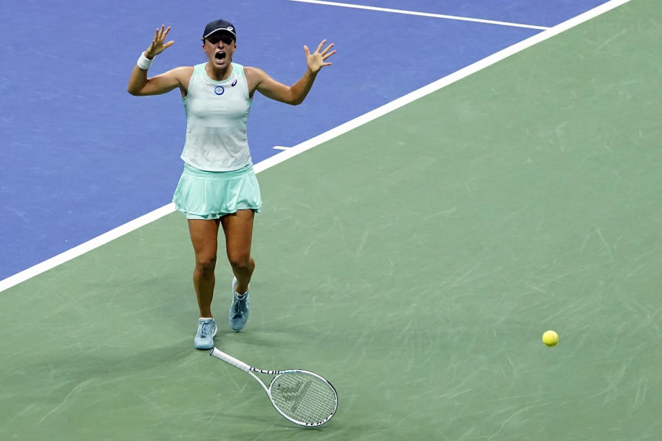 Iga Swiatek, of Poland, celebrates after winning her match against Jessica Pegula, of the United States, during the quarterfinals of the U.S. Open tennis championships, Wednesday, Sept. 7, 2022, in New York. (AP Photo/Frank Franklin II)