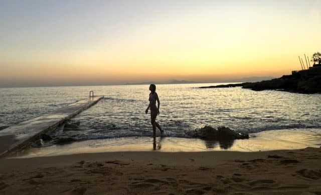 <p>Liam Hemsworth/Instagram</p> Gabriella Brooks on the beach in Greece