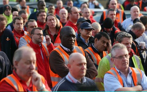 Royal Mail employees attend a rally organised by the CWU - Credit: Oli Scarff/Getty Images