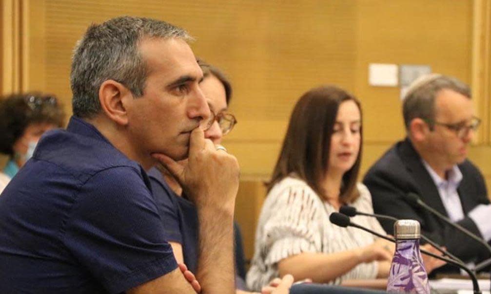 <span>Avi Dabush at an Israeli Knesset committee meeting in 2021. He will speak in Sydney and Melbourne on the path to peace in Israel and Palestine.</span><span>Photograph: Rabbis for Human Rights</span>