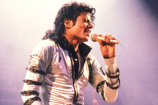 <p>George De Sota/Redferns</p> Michael Jackson performing in 1988