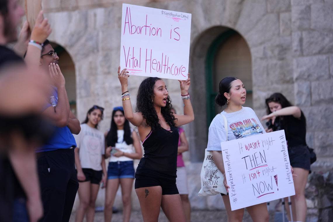 Protesters gather April 11 at the Arizona Capitol in downtown Phoenix to protest the recent Arizona Supreme Court ruling upholding an 1864 abortion law that bans the procedure in most cases.