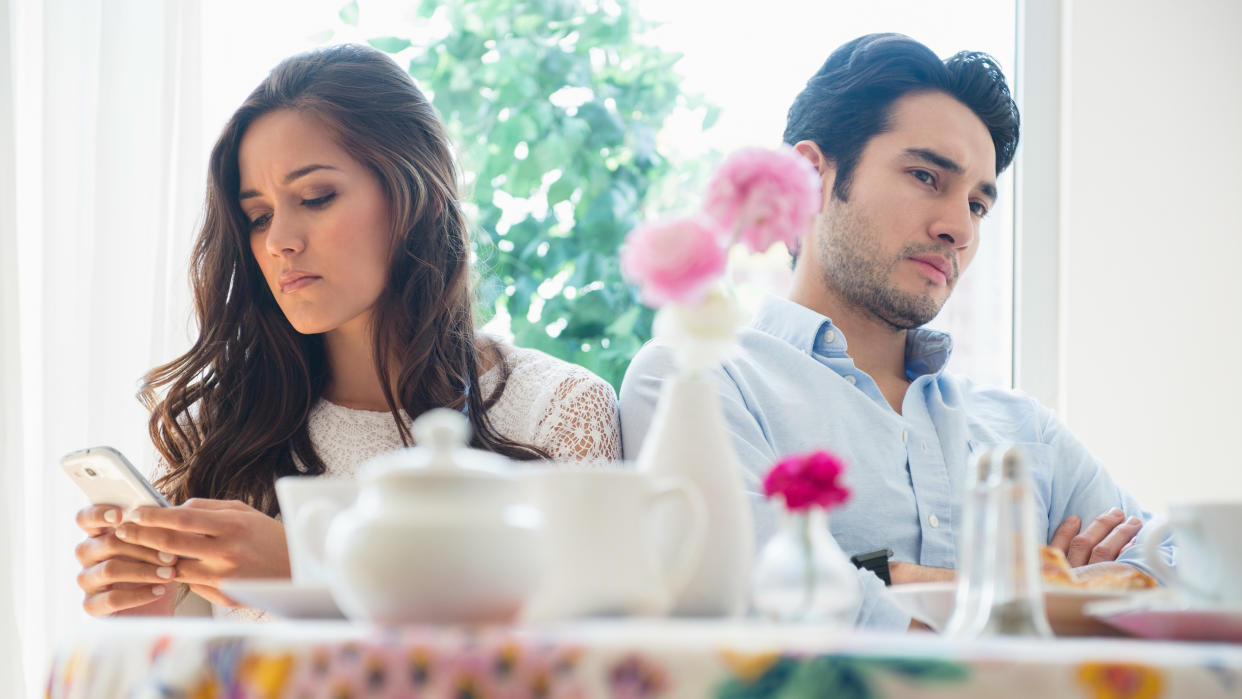  Couple arguing in restaurant 