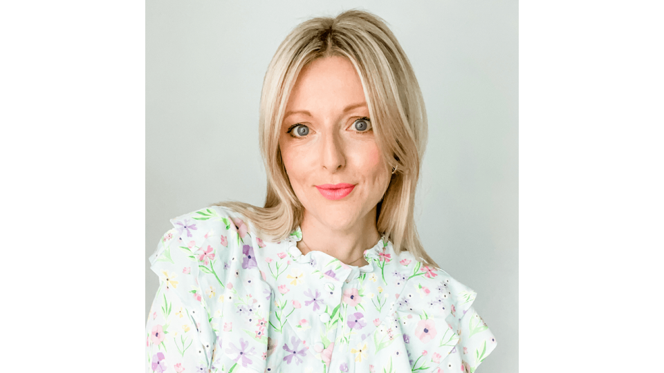 blonde lady in floral top