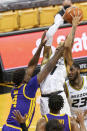 Missouri's Xavier Pinson, right, shoots as he is fouled by LSU's Darius Days, left, during the second half of an NCAA college basketball game Saturday, March 6, 2021, in Columbia, Mo. (AP Photo/L.G. Patterson)