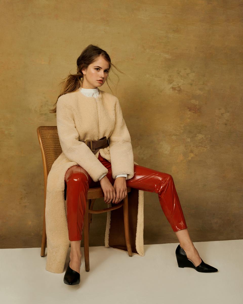 <cite class="credit">Photo by: Hanna Tveite | <em><strong>Longchamp Coat,</strong> $3,010. Longchamp.com.</em> <em><strong>Officine Generale Gabrielle Bandcollar Shirt,</strong> $275. Pooleshopcharlotte.com.</em> <em><strong>MSGM Vinyl Pants,</strong> $455. Msgm.it.</em> <em><strong>The North Face x HYKE Coyote Belt,</strong> Price Upon Request. Thenorthfacehyke.jp.</em> <em><strong>Beautiful Shoes X HYKE Pumps,</strong> Price Upon Request. Hyke.jp.</em></cite>