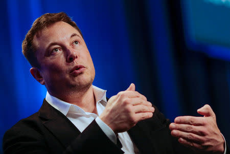 FILE PHOTO - Tesla and SpaceX CEO Elon Musk speaks in a "fireside chat" at the National League of Cities (NLC) 2018 City Summit in Los Angeles, California, U.S. November 8, 2018. REUTERS/Kyle Grillot