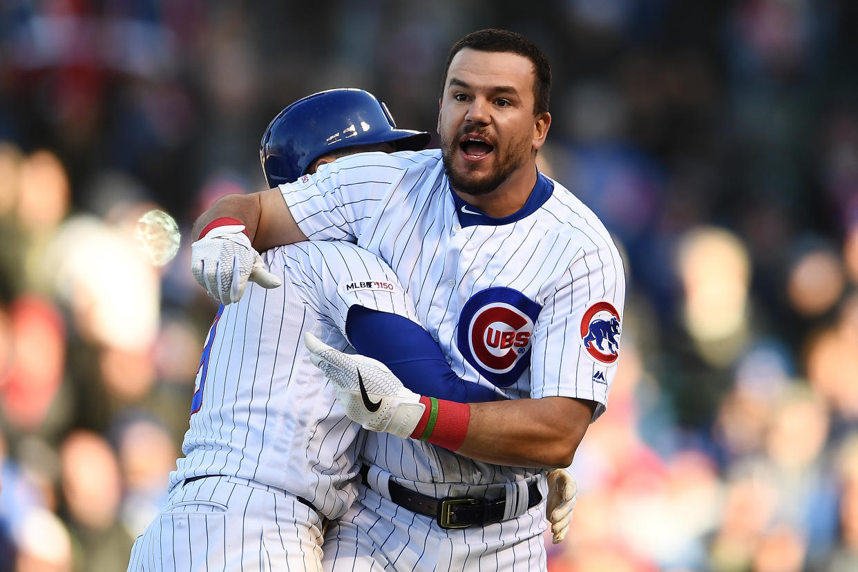 Kyle Schwarber of the Chicago Cubs had to be restrained after disagreeing with umpire Gabe Morales. (Photo by Stacy Revere/Getty Images)